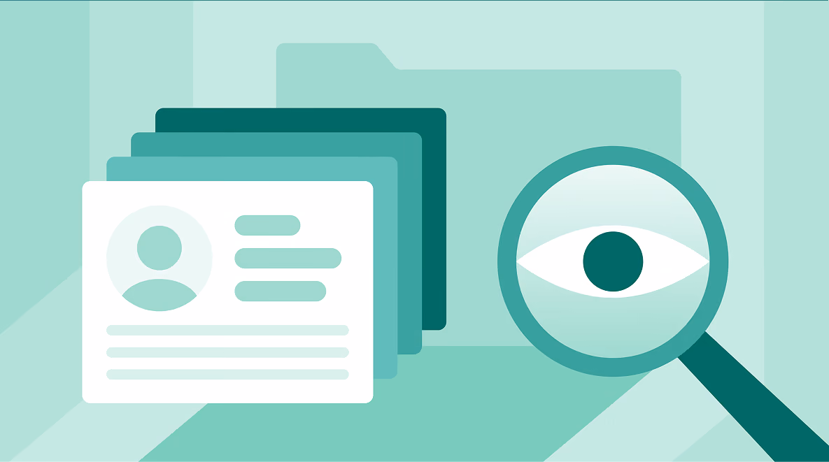 Magnifying glass with eye focusing on layered ID cards in front of a folder symbolizing data or profile review.
